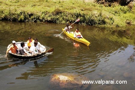 Boating Activity in Valparai Tourists enjoying boating activity near Valparai hill station
