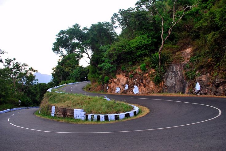 Valparai ghat road with sharp mountain hairpin curve
